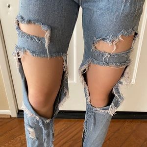 “Kendall & Kylie” light blue ripped jeans